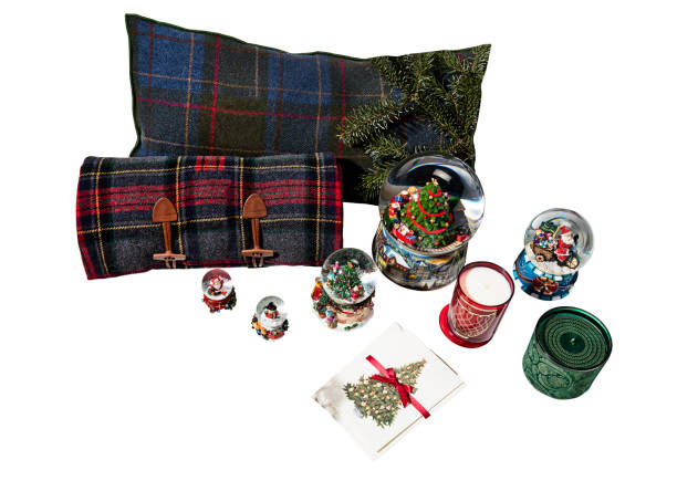 istock Merry christmas snow globes with candles and blankets 1189716494