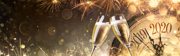 istock Happy New Year 2020 - Midnight With Champagne And Fireworks 1189718911