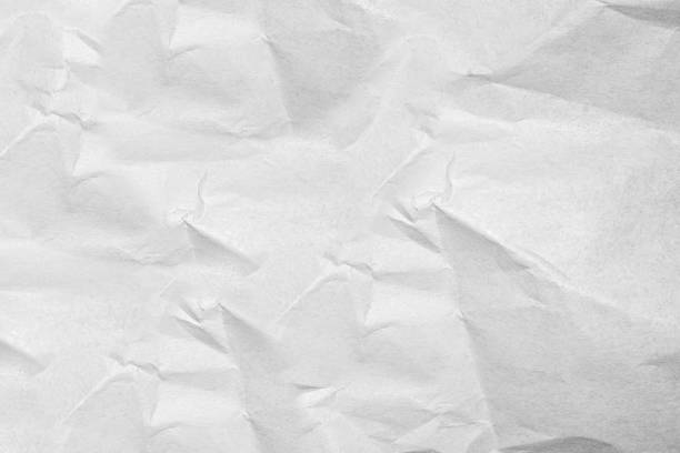 istock White crumpled paper texture for Photo background 1189719081