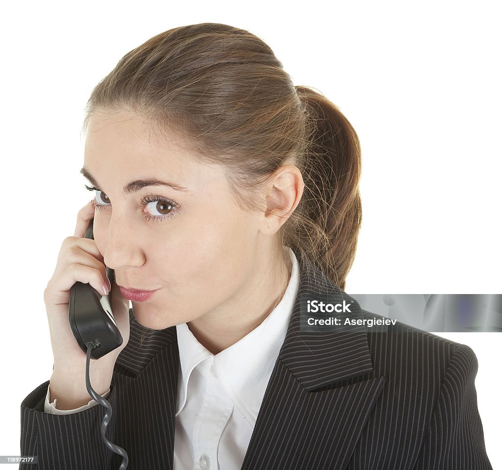 emotional woman with a telephone emotional woman in business clothing with a telephone Adult Stock Photo