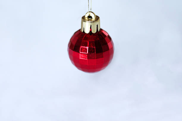 istock Red Christmas hanging ornament isolated on white background 1189724675