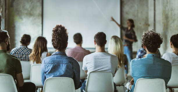istock Panoramic view of design professionals having training class in the office. 1189726203