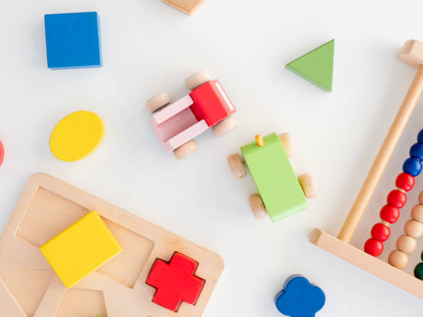 istock kids learning concept with stacking toys on white table background. 1189726993
