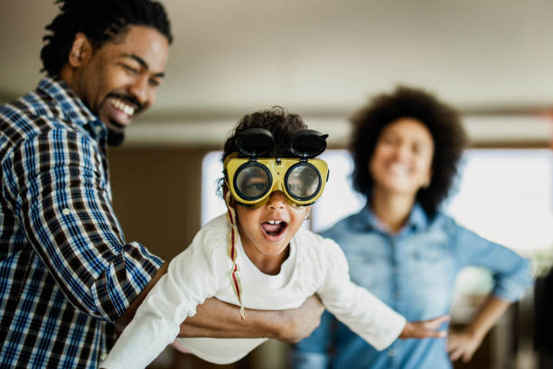 istock Wee daddy, I'm flying like an airplane! 1189729336