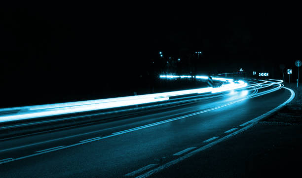 istock lights of cars with night 1189731653