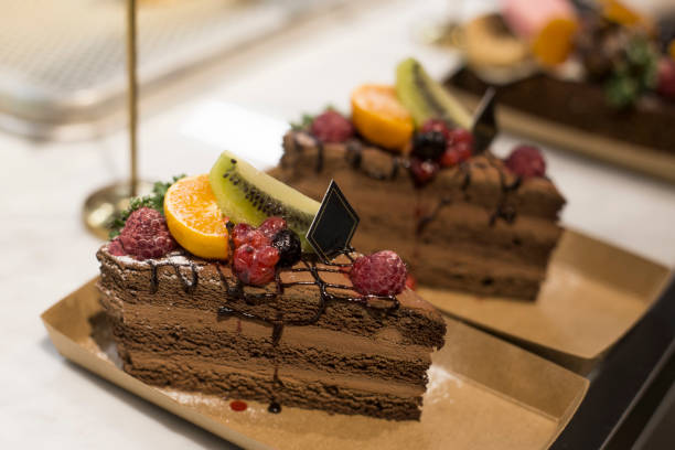 istock piece of layered chocolate cake 1189732528