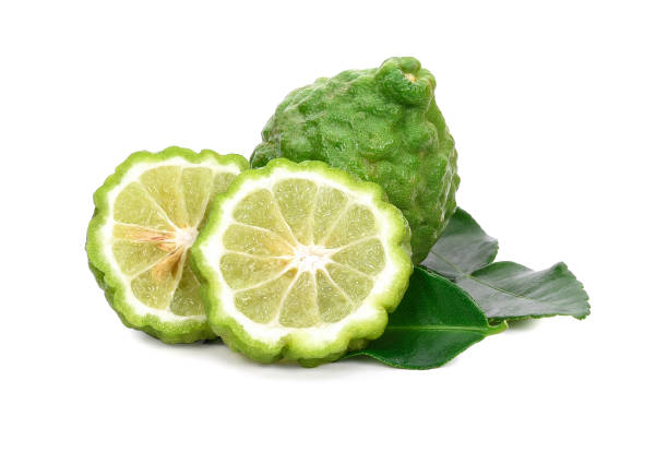 istock Fresh Bergamot fruit with leaf isolated on white background 1189732912