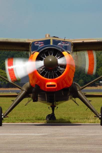istock Front view close up of propeller aircraft with spinning propeller 1189734201