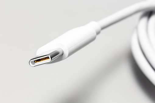 White USB Type C connector, on a white background closeup