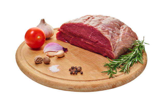 istock raw meat with vegetables and seasonings on the board 1189737128