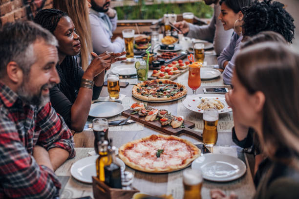 istock Friends enjoying in pub 1189739297