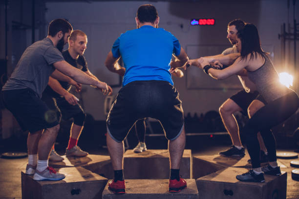 istock People exercising at the gym 1189739986