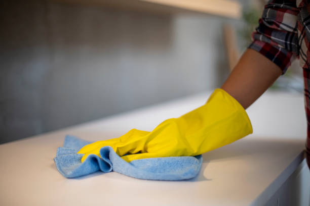 istock Close up hand wiping the dust. 1189744205