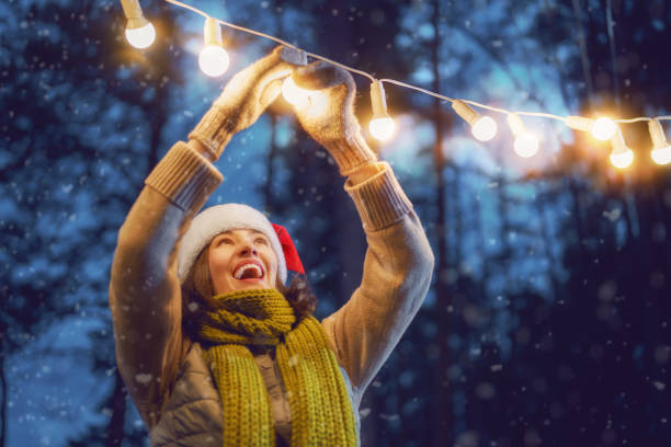 istock woman is decorating home outside 1189746750