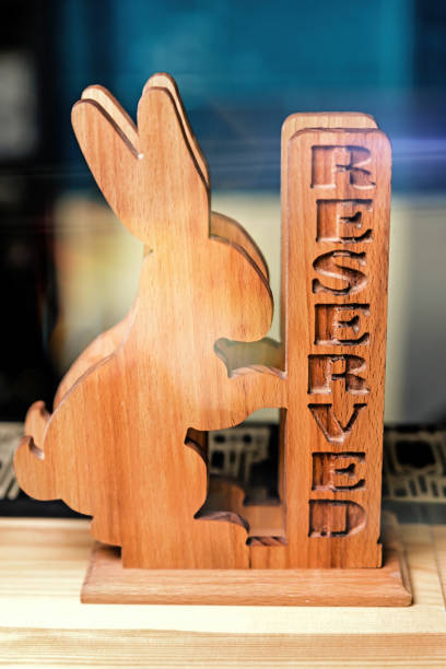 istock Wooden rabbit figurine with the inscription Reserved 1189747565