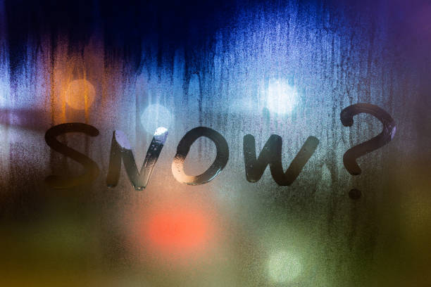 istock question snow written on night wet window glass close-up with bokeh background 1189748683