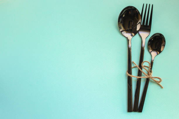 istock cutlery rustic, used for eating or serving (fork, knife, spoon, plate - set). food background. copy space 1189749892