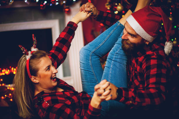 istock Christmas Couple Fun 1189749963