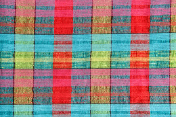 istock Grey fabric in a cage. Checkered gray cotton fabric as background texture. 1189751201