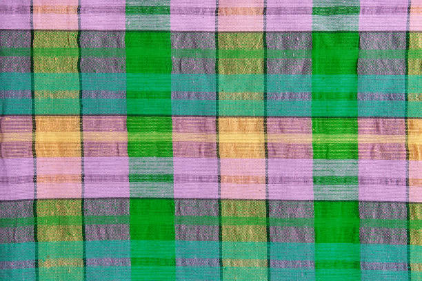 istock Grey fabric in a cage. Checkered gray cotton fabric as background texture. 1189751270