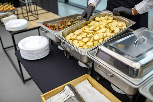 istock banquet table with chafing dish heaters At the restaurant 1189752146
