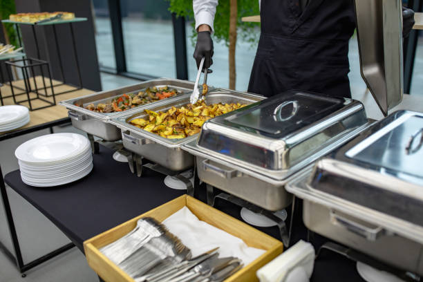 istock banquet table with chafing dish heaters At the restaurant 1189752150