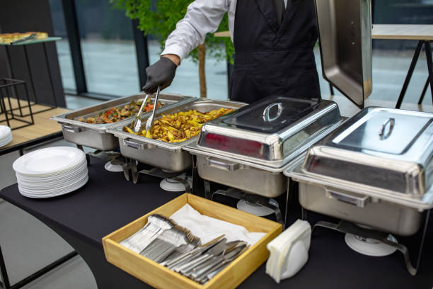 istock banquet table with chafing dish heaters At the restaurant 1189752154