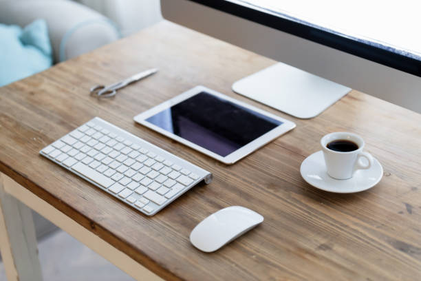 istock Picture of modern office desk with devices 1189753541