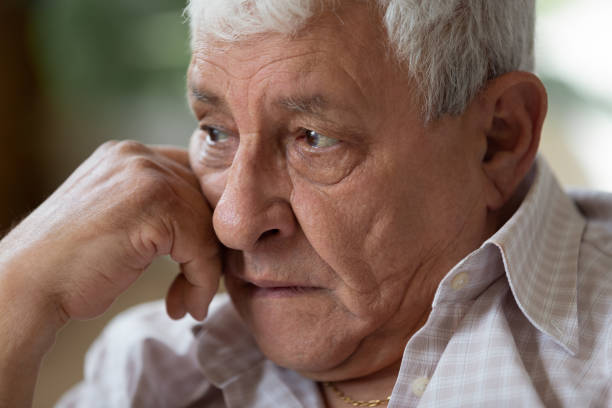 istock Thoughtful older retired man propping head with hand. 1189755051