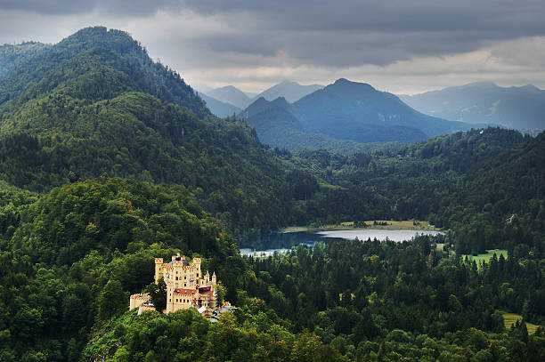 istock castle by lake in forest mountain peaks 118975623