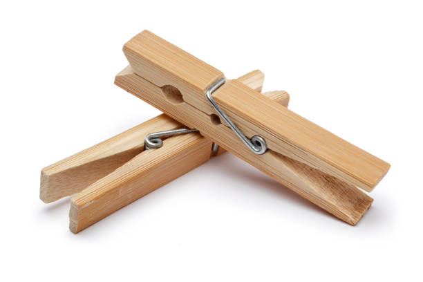 istock Wooden clothespin isolated on white 1189756604