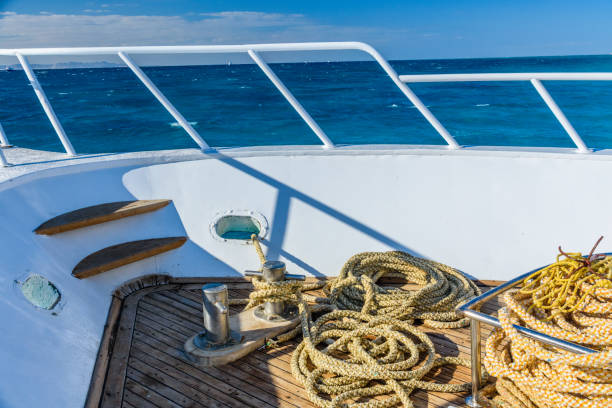 istock Thick ropes and different tackles on a yacht 1189756827