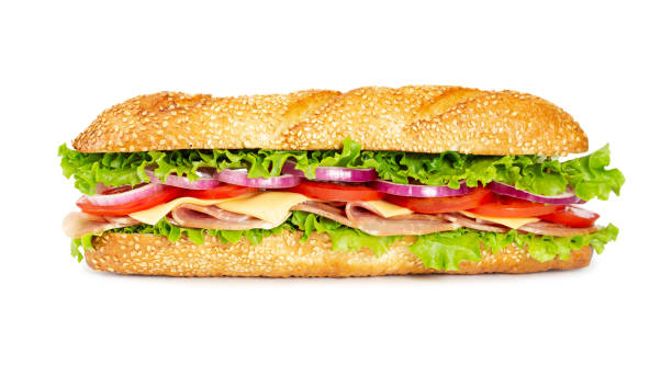 Sandwich with ham, tomato, cheese, onion and lettuce Sandwich with ham, tomato, cheese, onion and lettuce isolated on white background submarine photos stock pictures, royalty-free photos & images