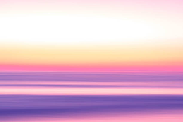 istock Motion blur tropical sunset beach with bokeh light wave abstract background. 1189757790