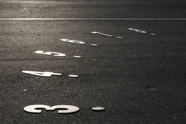Metal numbers on the stone floor