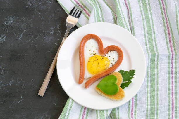 istock Valentine's day Breakfast is scrambled eggs with heart-shaped bread. The view from the top 1189760631