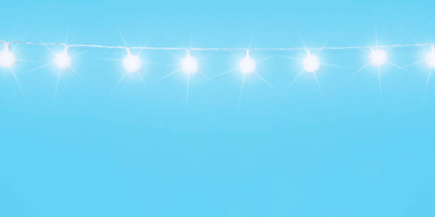 istock Christmas ornaments on cyan blue background 1189761403