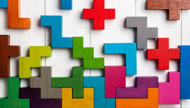 istock Top view on colorful wooden blocks folding on white wooden background 1189761803