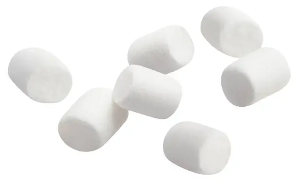 Photo of Flying marshmallows on white