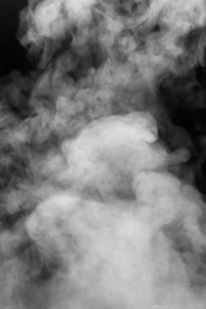 istock White smoke or dense steam on black background, texture, overlay 1189762693