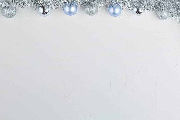 istock Garland with silver balls decorations on white 1189765057