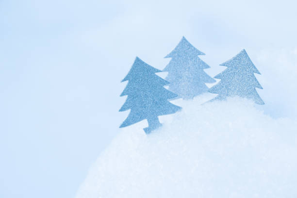 istock Three Abstract Christmas tree in snowdrift. Greeting card 1189766808