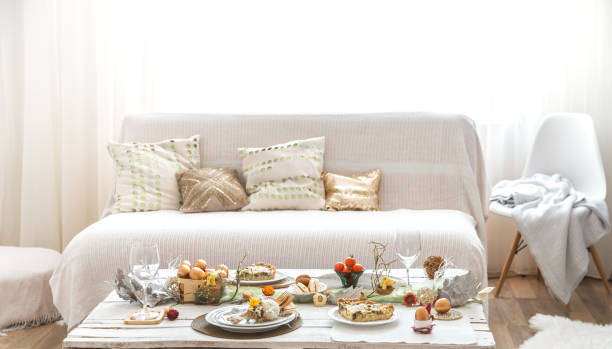 istock The interior of the room with a festive Easter table . 1189768375