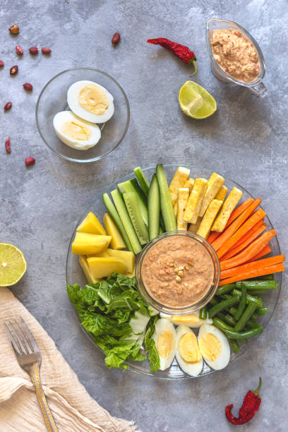 istock Flat lay with gado-gado salad on a gray background 1189772050