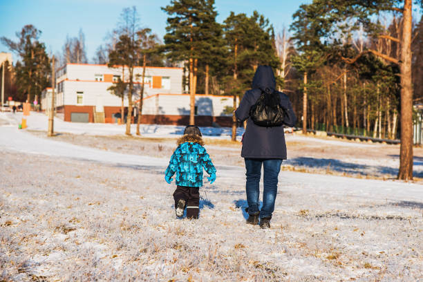 istock Mother and little son on a walk 1189772245