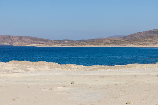 istock Shoreline of Mytakas beach with mountains 1189775500
