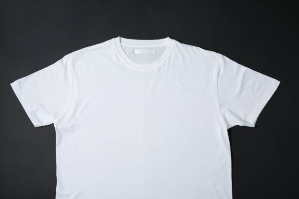 istock Blank white t-shirt on black background, space for text 1189776743