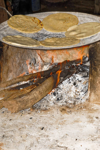 istock Making tortillas over a wood fire 1189777353