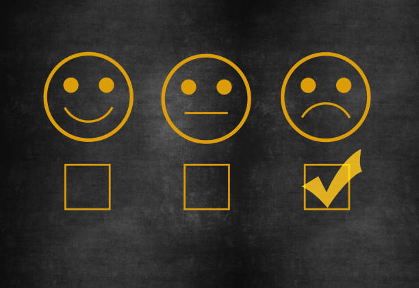 istock Giving rating with sad icon 1189777959
