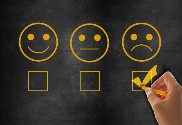 istock Businessman giving rating with sad icon 1189778109